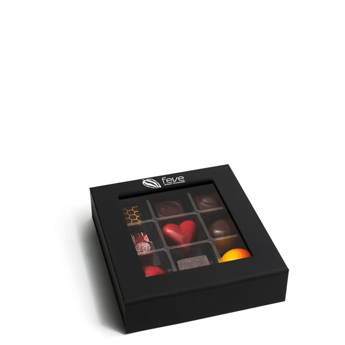 An assortment of milk and dark chocolate truffles showcasing Feve's top flavors.  A luxury chocolate collection like no other.  Makes a great holiday gift, business gift, or client gift.  Locally made in San Francisco with natural ingredients and sustainable, fair-trade chocolate.